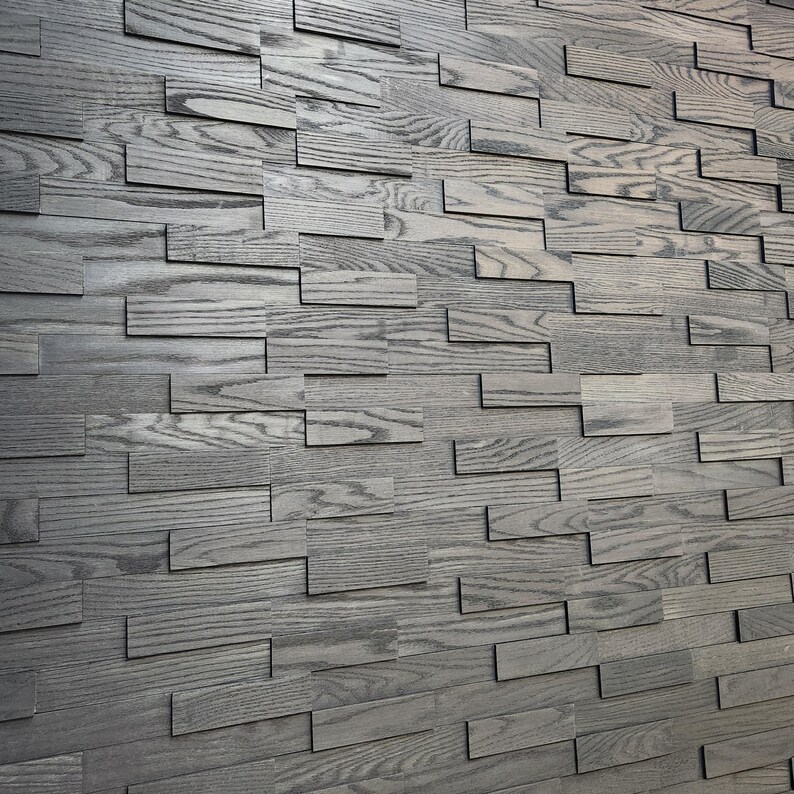 Acoustic Wooden Wall Tiles in various colors, showcasing the 3D brick layout design made from solid wood, perfect for enhancing sound quality in any space.