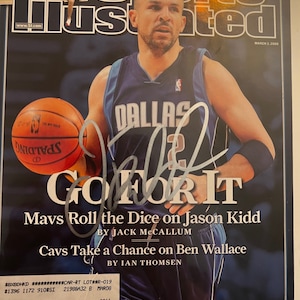 May include: Sports Illustrated magazine cover featuring Dallas Mavericks basketball player Jason Kidd in a blue jersey with the word "Dallas" on the front. The cover headline reads "Mavs Roll the Dice on Jason Kidd" and "Cavs Take a Chance on Ben Wallace".