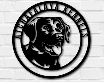 May include: Black metal sign with a silhouette of a Labrador Retriever's head inside a circle. The text "Atchafalaya Kennels" is written around the circle.