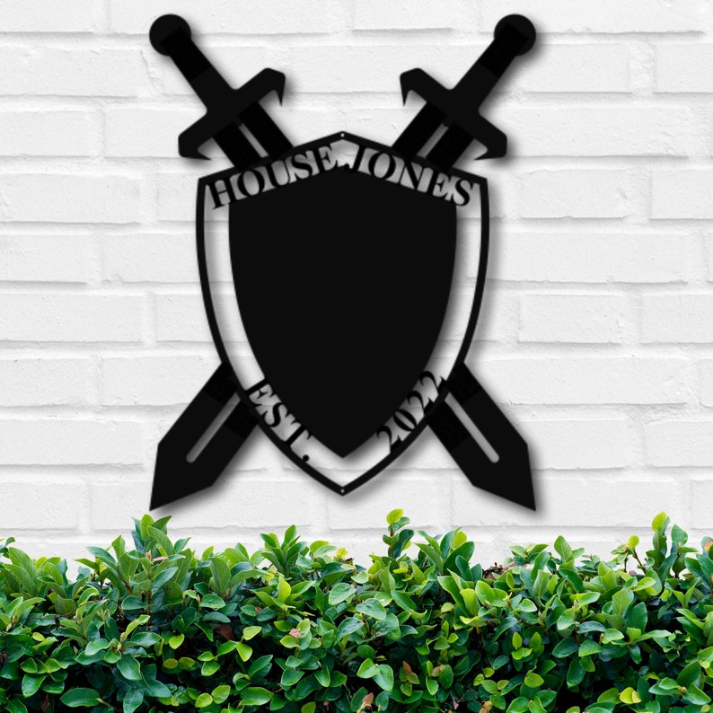 May include: Black metal shield with crossed swords, featuring the text "HOUSE JONES EST. 2022".