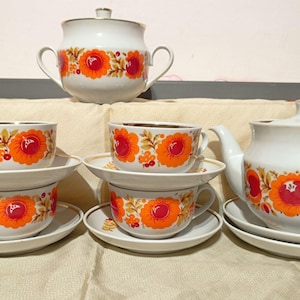 Vintage rysk tekopp tekanna sockerskål ringblomma