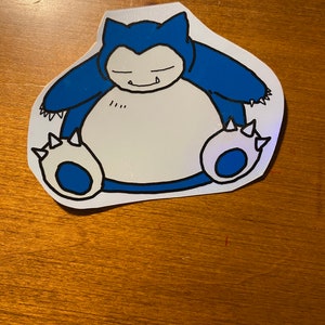 Holographic snorlax sticker