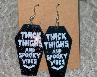 thick thighs and spooky vibes earrings