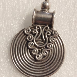 Rajasthan India silver spiral pendant.