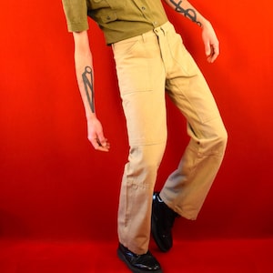Pantalones de trabajo Lee vintage de los años 70: vaqueros de trabajo de algodón beige con ligero vuelo (talla W28 L33)