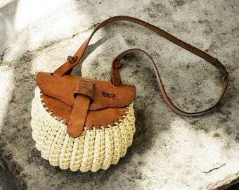 レザー編み込みハンドバッグ ヴィンテージ ハンドメイド 70年代のヴィンテージイタリア製編み込みストロートートバッグ