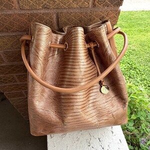 Brahmin Trina Cabana Drawstring Copper Tan Bucket Tropical Palm Leaf Embossed Leather Side Zip Pockets Hobo Shoulder Bag Artistic Rare