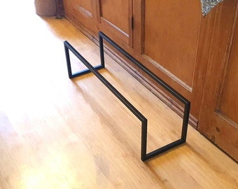 Modern steel box section design shoe rack. Handmade and crafted in the UK