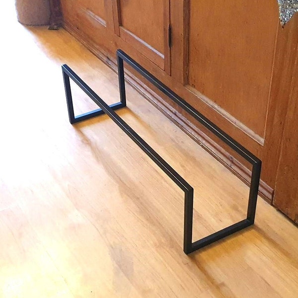 Modern steel box section design shoe rack. Handmade and crafted in the UK