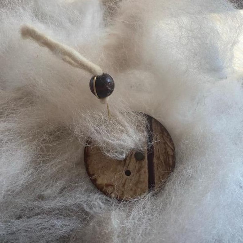 Diz showing use with diz threader and alpaca wool.