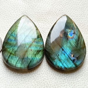 2pieces teardrop natural labradorite green flashy fire both side polished wholesale calibrated teardrop shape size 51x36x7mm use for jewelry