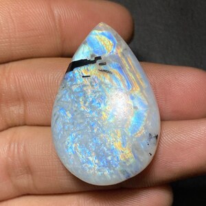 Terrific ~Multi Blue Flashy Rainbow Moonstone Cabochon Size:- 39x25x6  MM. Big Pear Shape With Black Tourmaline Gemstone Use For Jewelry.!!