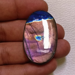 Labradorite Oval Shape Purple  Labradorite Cabochon Loose Palm Stone Labradorite Both Side high hand polished Size:- 42x26x6 MM 75 CTS.
