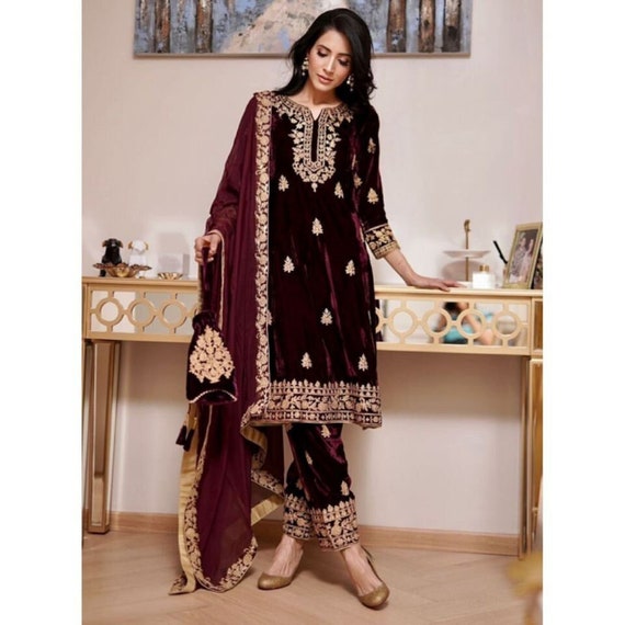Beautiful Velvet Kurti Embellished with hand embroidery work. Paired with  pant and net dupatta. T… | Indian designer outfits, Velvet kurtis design,  Clothes design