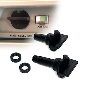 May include: Black fuel selector knobs and O-rings. The image shows a fuel selector switch with the text "FUEL SELECTOR" and an "OFF/ON" indicator. Two knobs and two O-rings are displayed.