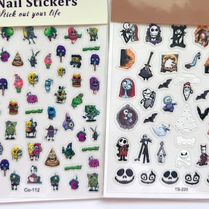 May include: Two sheets of 5D nail stickers. One sheet features cartoon characters and ice cream designs. The other sheet has Halloween-themed stickers with characters and imagery from The Nightmare Before Christmas. Text on the sheets reads "5D Nail Stickers" and "- nailart-".
