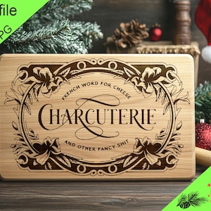 May include: A wooden cutting board with a decorative design featuring a floral motif and the text "French word for cheese Charcuterie and other fancy shit".