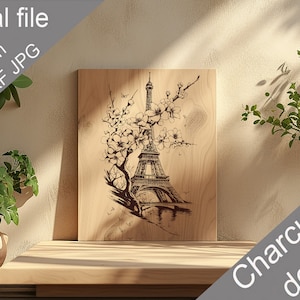 May include: A digital file design of the Eiffel Tower with cherry blossoms in a brown and white colour scheme. The design is on a wooden background with the text "Charcuterie design" in the bottom right corner.