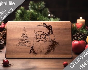 May include: A wooden cutting board with an engraved image of Santa Claus and a Christmas tree. The text "Charcuterie design" is printed on the bottom right corner of the board.