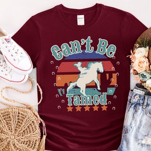 Western-T-shirt Can&#39;t Be Tamed: grappig T-shirt met paardrijprint