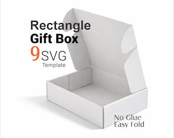 May include: A white rectangular gift box with an open lid. The text on the image reads Rectangle Gift Box, 9 SVG Template, and No Glue Easy Fold. The box is constructed from a single piece of material with visible fold lines and side flaps.