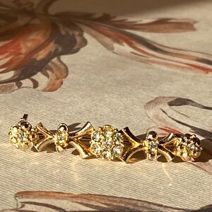 Rhinestone brooch, floral decoration, plated, DX, from the 60s.