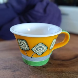 Handmade Ceramic Coffee Mug: Yellow Pottery Tea Cup with Abstract Flowers
