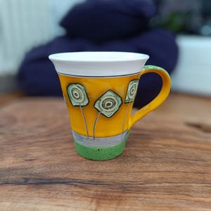 Handmade Ceramic Coffee Mug: Yellow Pottery Tea Cup with Abstract Flowers