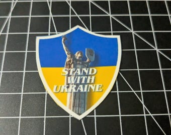 Stand With *UKRAINE* Mother Ukraine Statue Full Color Laminated Morale Stickers (Shield/English) (Eng)