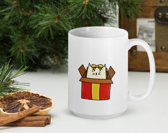 プレゼントボックスに入った猫のマグカップ - クリスマスコーヒーまたはティーカップ