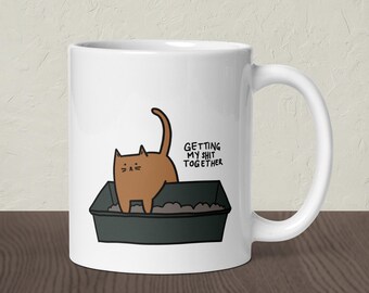 おもしろ猫マグカップ - ゲッティング・マイ・シャット・トゥゲザー、セラミックコーヒーカップ