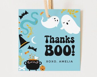 May include: Blue and white Halloween thank you tag with ghosts, a witch's hat, a cauldron, and candy. The text reads "Thanks BOO! XOXO, Amelia."