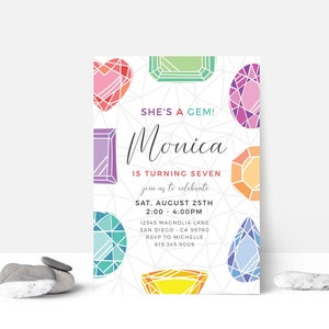 May include: A colorful invitation with a geometric design featuring gemstones. The invitation is for Monica's 7th birthday party. The text reads "She's a Gem! Monica is turning seven. Join us to celebrate Sat, August 25th 2:00-4:00pm 12345 Magnolia Lane San Diego, CA 96780 RSVP to Michelle 619.345.9009"