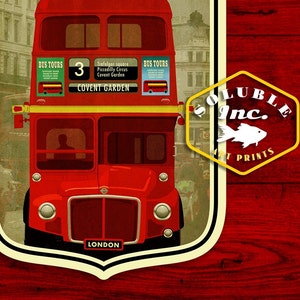 May include: A red double-decker bus with the number 3 on the side, driving through a city street. The bus has a sign that says "BUS TOURS" and "Trafalgar Square, Piccadilly Circus, Covent Garden". The bus is in front of a yellow and white shield with the text "Soluble Inc. Art Prints".