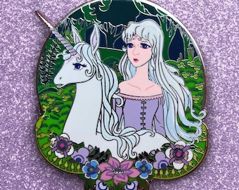 May include: A white unicorn with a silver horn and a woman with long white hair and a purple dress stand in a green forest with flowers. The image is a colorful enamel pin.