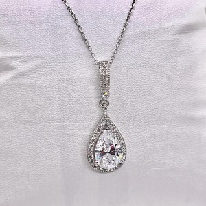 Pear Cut 3 Ct Moissanite Pendant: Sterling Silver Halo Necklace image 9
