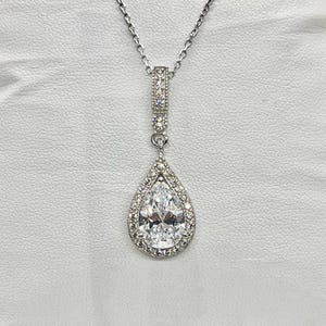 Pear Cut 3 Ct Moissanite Pendant: Sterling Silver Halo Necklace image 11