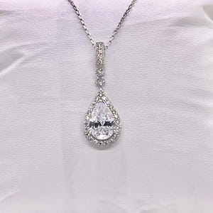 Pear Cut 3 Ct Moissanite Pendant: Sterling Silver Halo Necklace image 5