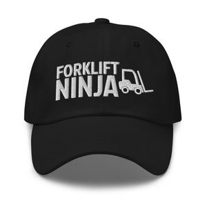 May include: Black baseball cap with white embroidered text that reads "Forklift Ninja" and a small forklift graphic.
