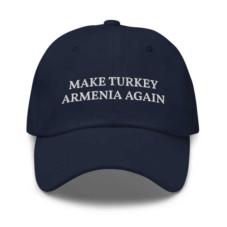 May include: A navy blue baseball cap with white embroidered text that reads "MAKE TURKEY ARMENIA AGAIN".