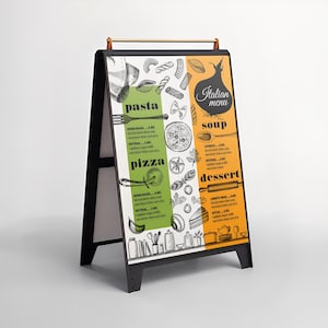 May include: Black A-frame chalkboard sign with a gold-colored handle. The sign features an Italian menu with pasta, pizza, soup, and dessert sections. The menu includes illustrations of food items and the words "Italian menu."
