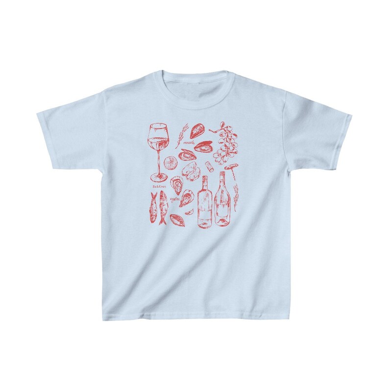 May include: Light blue t-shirt featuring a red illustration of wine, oysters, mussels, and fish. The text "oysters", "mussels", and "delicious" are included in the design.