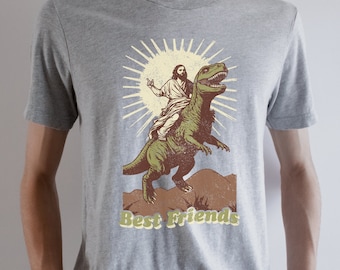 Jesus Riding A Dinosaur Shirt, Buddy Jesus Shirt, Novelty Shirt, Funny Dinosaur Shirt, Funny Religion Shirt, Funny Gift for Boyfriend