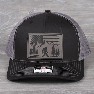 Sasquatch USA Mountains Patch on a Richardson 112 Trucker Snapback Hat