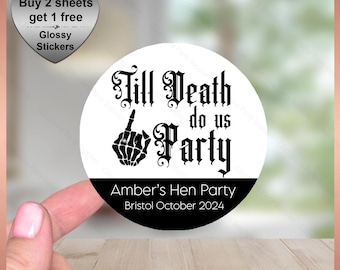 May include: Black and white round sticker with the text "Till Death do us Party" and a skeleton hand giving the middle finger. The text "Amber's Hen Party Bristol October 2024" is below the main text.