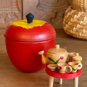 May include: A rustic wooden sign with the text "Welcome to our home" in a handwritten style. The sign features a distressed finish and a simple, inviting design, perfect for entryway decor.