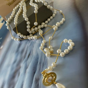 New in Box Vivienne Westwood Gold Mini Orb Pearl Bracelet -  Israel