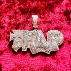 14kt white/rose   gold finish Trap pendant