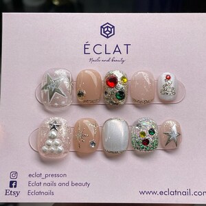 Festive nails. Fun unique Christmas mails. Reusable hand made press on nails. Glue on nails. Gel manicure.