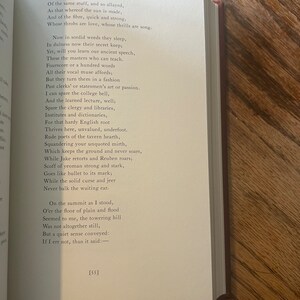 May include: A close-up of a book page featuring a poem printed on it. The poem explores the beauty of nature and the simple pleasures of life. The text is in a classic font and is easy to read. The page is cream-coloured and has a slightly textured surface.